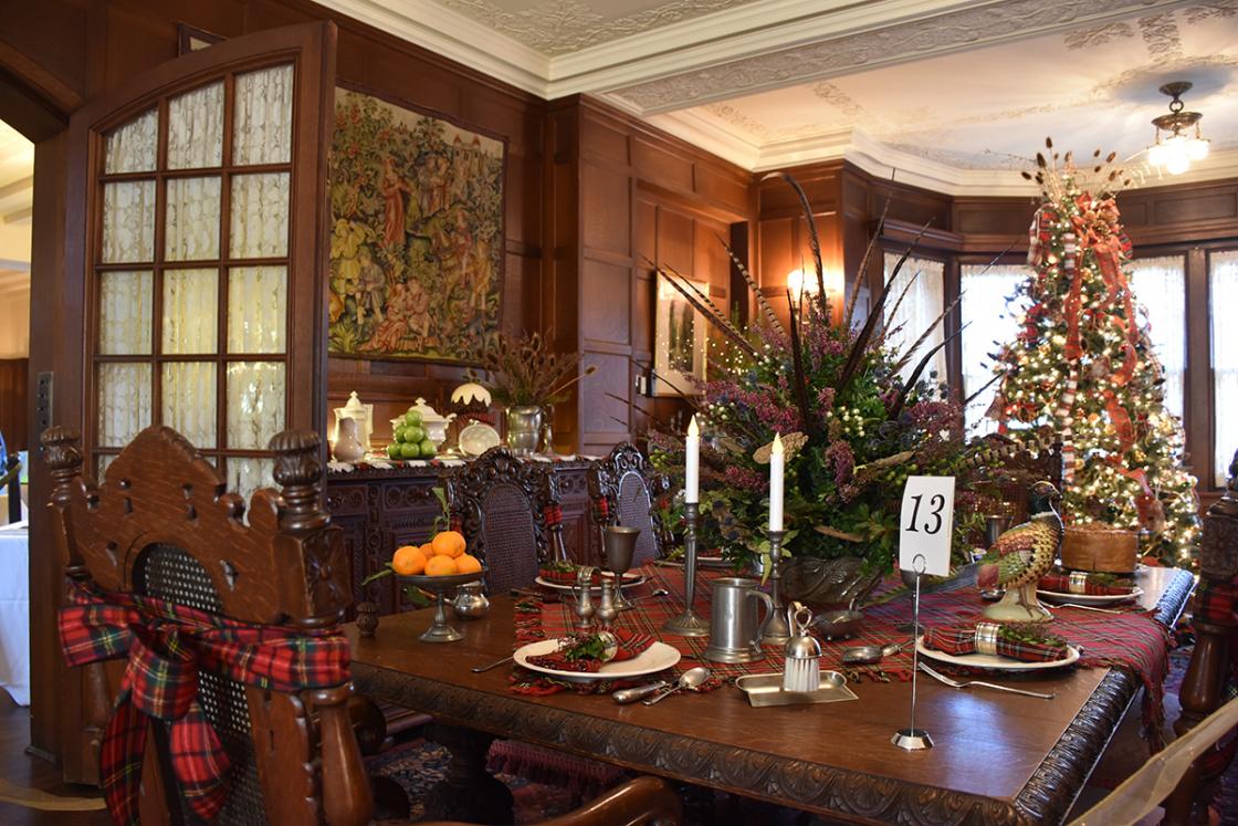 Photograph of the Cranbrook House Dining Room decorated for the holidays.