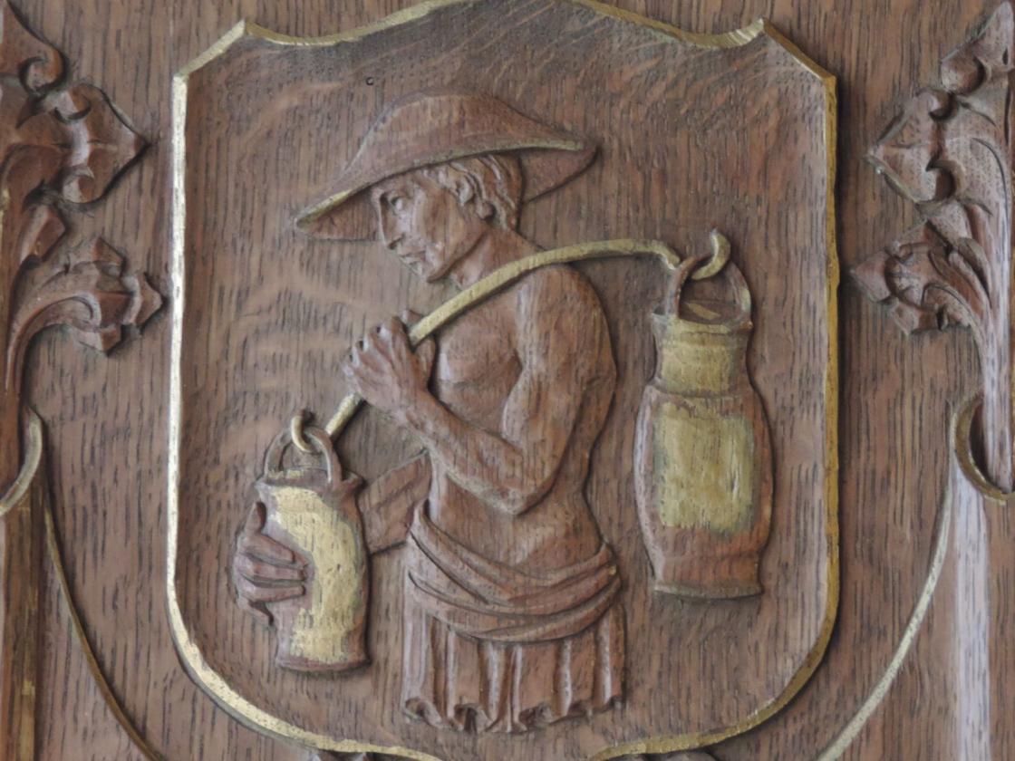 Photograph of a cartouche in the Cranbrook House Library.