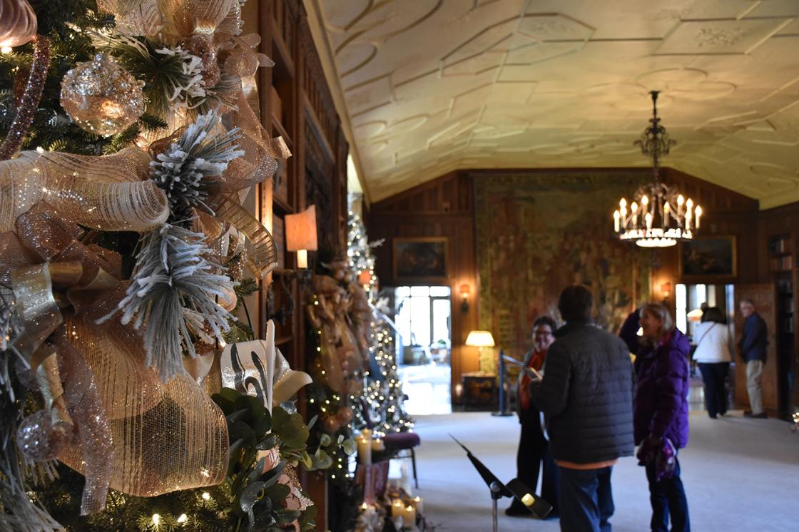 Photograph of the Cranbrook House Library decorated for the holidays.