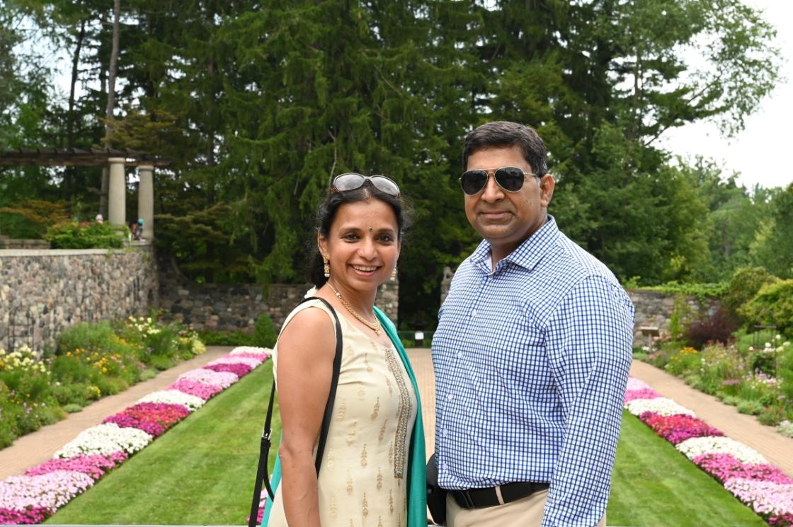 Photo of two visitors in the Sunken Garden.
