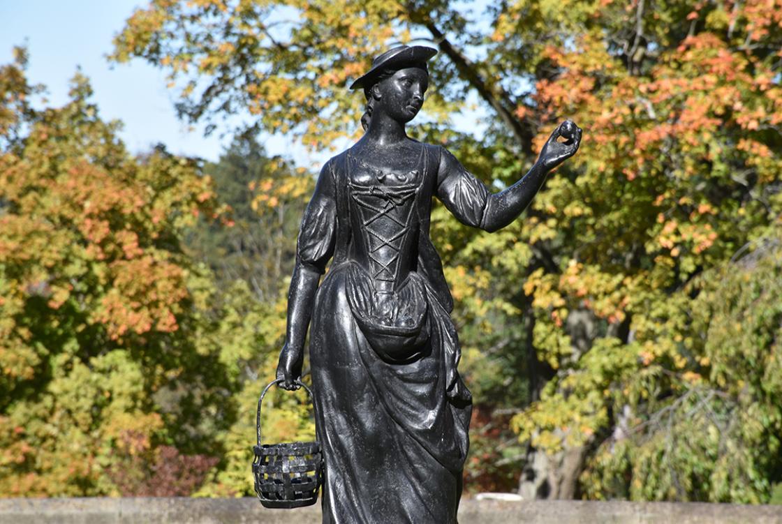 Photograph of The Shepherdess on The Library Terrace at Cranbrook Gardens in the fall.