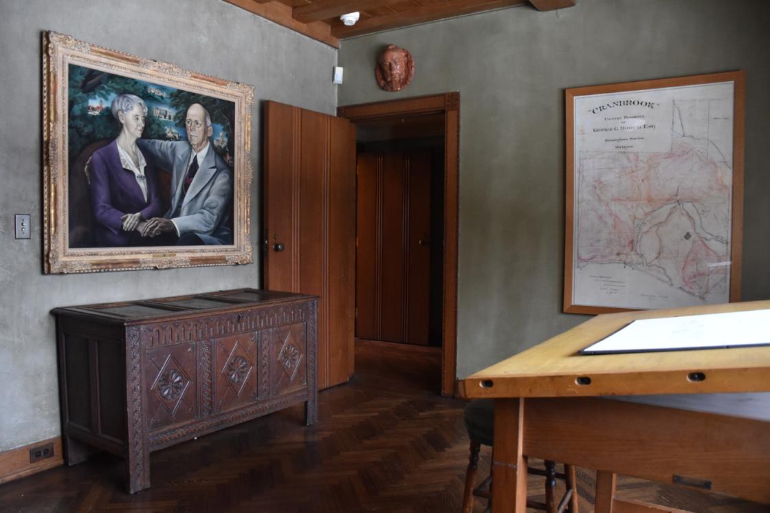 Photograph of the Cranbrook House Drafting Room and a painting of the Booths by Zoltan Zepeshy. 