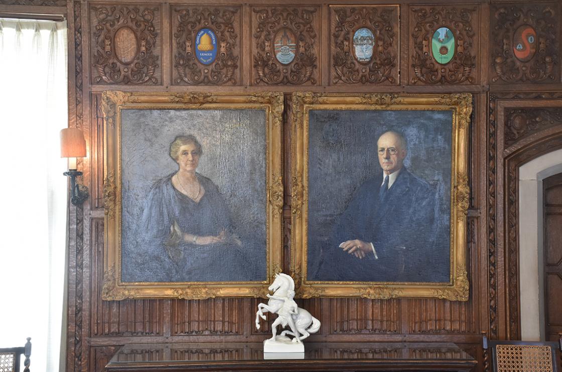 Photograph of cartouches and portraits of the Booths in the Cranbrook House Oak Room.